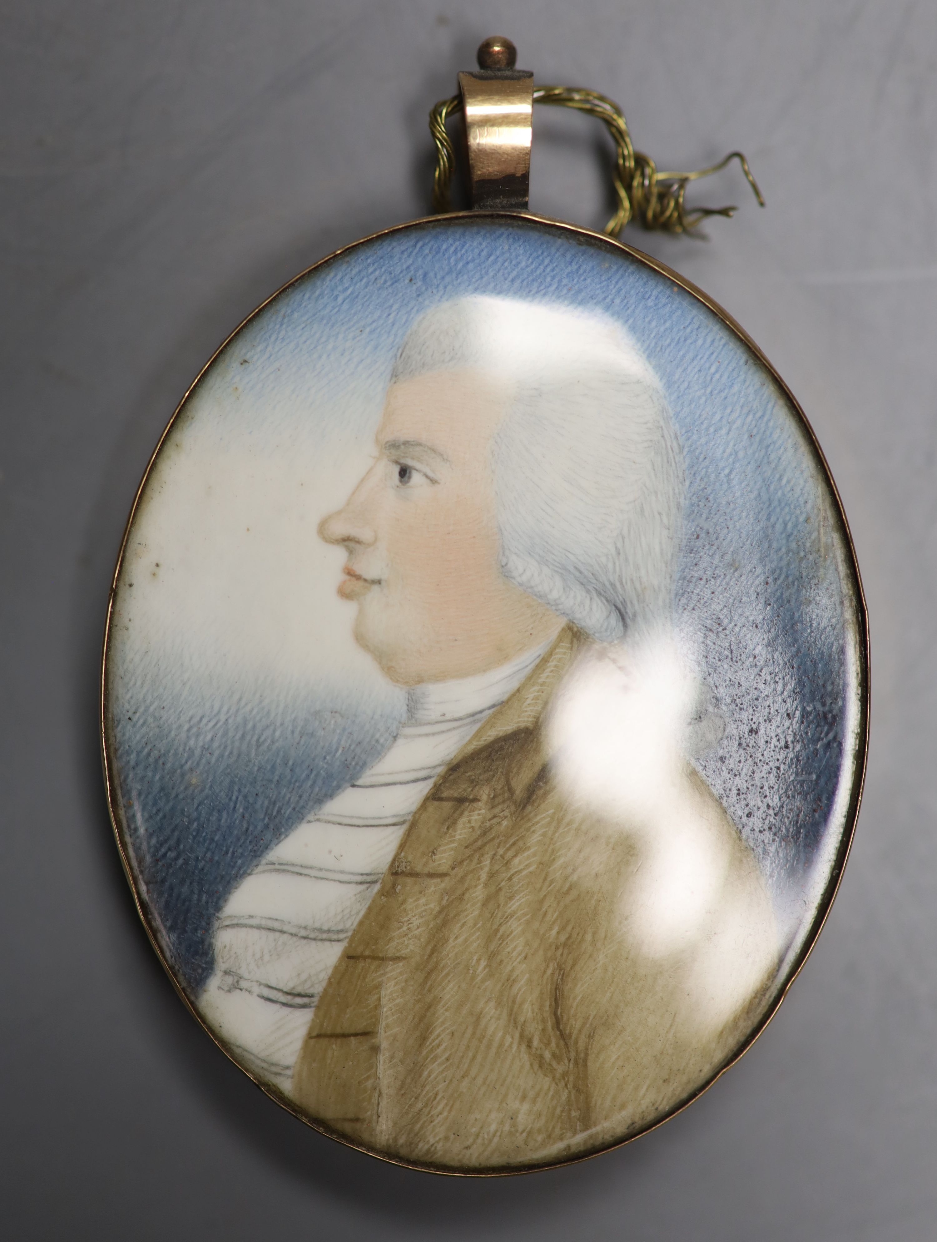 English School (early 19th century), watercolour on ivory, miniature profile portrait of a gentleman